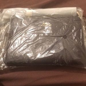 Brand NEW .. Chocolate Brown Coach wristlet